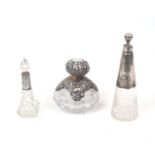 A German Art-Nouveau style silver mounted glass vanity bottle, of conical form with spherical silver