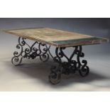 A large French wrought iron garden table, early 20th Century, with rectangular oak parquetry top, on