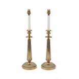 A pair of table lamps, 20th century, of candlestick form, moulded brass with faux-candle modern bulb