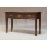 A George III joined oak dresser base, late 18th Century, four plank top, fitted with three short