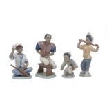 A group of Lladro figures, 20th century, Spanish, to include; an American Football player, with