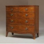An early Victorian bow fronted mahogany chest of drawers, circa 1840, fitted with two short