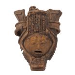 A Pre Columbian terracotta head, Mexico, Vera Cruz, after 5th century, with ornate head-dress,