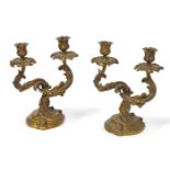 A pair of French gilt-bronze twin-light candelabra, cast by Susse Fres, late 19th century, of