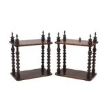 A pair of Victorian beech hanging shelves, each with turned and knopped baluster stems, 31cm high (