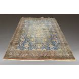 A West Persian blue ground carpet, mid to late 20th Century, all-over design in a blue field, the