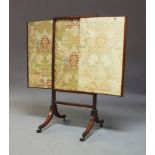 An early 19th Century and later mahogany fire screen, circa 1820, comprising a central section and