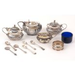 Four silver mustards, together with five various silver condiment spoons and a silver napkin ring,