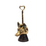 A Victorian gilt brass and cast iron door porter, modelled as the head of a fox atop a horse’s hoof,