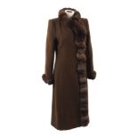 A Raffaella Curiel full length coat with chinchilla fur trim, together with a full length reversible