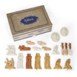 A collection of modern miniature plaster figurines, depicting various animals and characters from