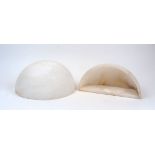 A pair of alabaster wall uplighter shades, 20th Century, of quarter spherical form with hollowed