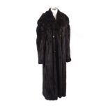 A full length double breasted mink coat, by Riva, London, with brass buttons, full length sleeves