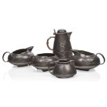 Archibald Knox (British 1864-1933), a Liberty & Co pewter part tea service, first half 20th century,