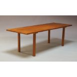 A Danish teak coffee table, in the manner of Andreas Tuck, the rectangular top raised on square