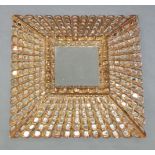 A gilt framed modern wall hanging mirror, emerald form, mirrored mosaic canted sides, square