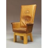 A mid to late 20th Century Judge's chair, upholstered with a brown leather back and seat, the back