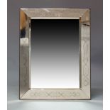 A French wall mirror, c.1950, of rectangular form with engraved peach mirrored border, 91cm x 70.