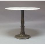 A 'Lucy' Bistro table, of recent manufacture, with circular white marble top, on cast metal base,