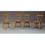 Lucian R Ercolani, a set of four beech and elm stacking chairs for Ercol, c.1960, with single curved