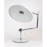 A modern desk lamp, 20th century with articulated stand and base, in chrome and white, approx.