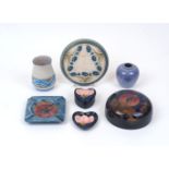 A group of modern decorative pottery, comprising a Moorcroft ash tray, 12cm x 12cm, a Moorcroft
