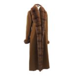 A full length cashmere and mink coat by Thomas Steiger, the cashmere by Dormeuil, with single button