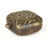 An fine openwork bronze box, Tibet, 19th century, of square form, with suspension loops either side,