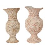 Two Thai pottery vases, Ban-Chiang, each of globular form with flaring neck supported on a spreading