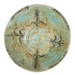A Kashan turquoise-glazed pottery bowl, Iran, 12th century, of conical form on short foot, painted