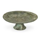 A Khorassan engraved bronze footed bowl, Iran, 11th-12th century, on a high spreading foot, engraved