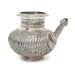 A silver repousse decorated lota, India, 20th century, on a spreading foot, decorated with