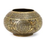 A Cairoware silver inlaid brass bowl, Egypt or Syria, 19th century, on a short foot, decorated