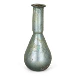 An intact Roman greenish-blue glass perfume bottle, 4th century AD, of globular form with a