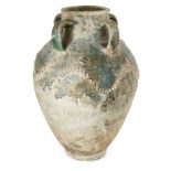 A large post-Sasanian green-glazed pottery storage jar, Iran, 8th-10th century, of baluster form