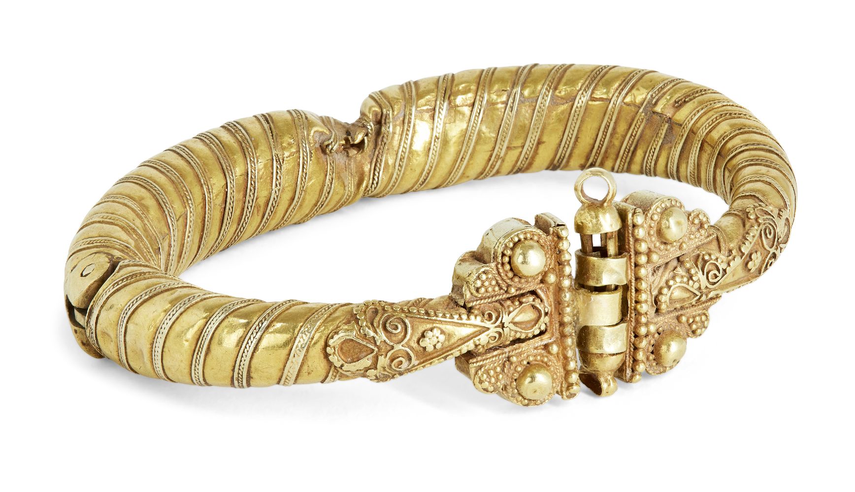 A Seljuk gold bracelet, Iran, 12th century, constructed from gold sheet wrapped around a crescent-