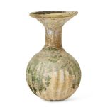 A Roman glass sprinkler flask, circa 4th century A.D., the globular body with vertical ribbing,