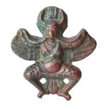 A bronze plaque of Garuda, Tibet or Nepal, 17th century or earlier, the horned deity depicted with
