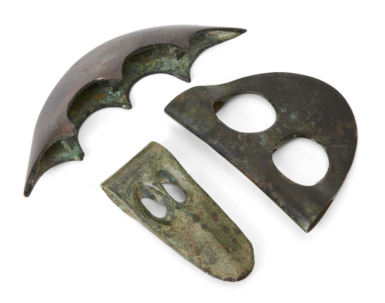 Two Near Eastern bronze axe heads and a Near Eastern bronze crescentic attachment or axe, comprising