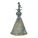 A Seljuk bronze camel bell, Iran, 11th-12th century, of conical form, with an openwork globular form