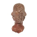 An Egyptian style quartzite head of a Ramesside style quartzite head of a king, wearing the Blue