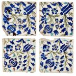 Four Damascus Iznik tiles, Syria, 17th century, each of square form, underglaze painted in cobalt,