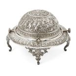 A Qajar engraved silver serving dish, Iran, late 19th-early 20th century, on three openwork feet