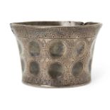 An engraved and repousse silver vessel in the Sasanian style, 7.5cm. high, 395 grams Provenance: