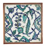 An Ottoman Damascus Iznik pottery tile, of square form, underglaze painted in turquoise, green and