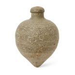 A sphero-conical earthenware vessel, Egypt or Iran, 10th-11th century, of inverted pear shaped
