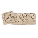 A limestone relief fragment depicting three doves in foliage, not ancient, 44.5 x 15.2cm. Please