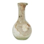 Six glass vessels including an unguentarium with tall cylindrical neck and applied trail, 15.2cm;