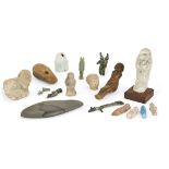 A collection of Egyptian antiquities and later items, including an ushabti, a 20th Dynasty amulet of