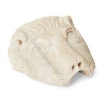 A carved marble feline head fragment, possibly from a water feature, 14.5cm. long Provenance: